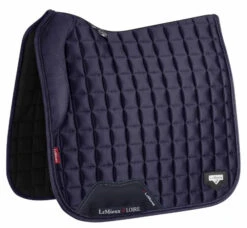 LeMieux Loire Memory Foam Dressage Pad 18 LeMieux Loire Memory Foam Dressage Pad -Horseware Ireland Sales loire drsg memory navy side 6361 lemieux 45135.1677098434
